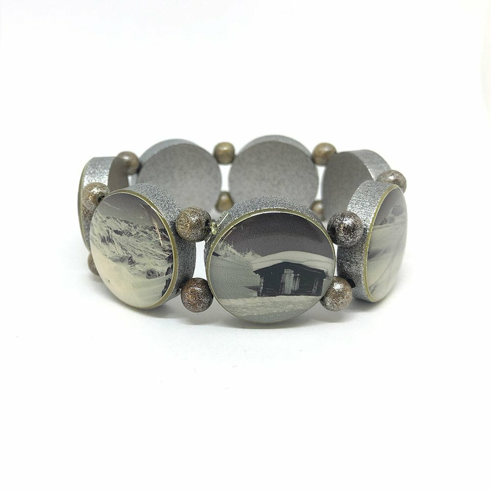 Wooden bracelet brown with silver pigments and winter motifs