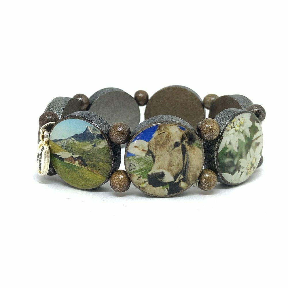Bracelet en bois marron avec pigments argentés et motifs alpins