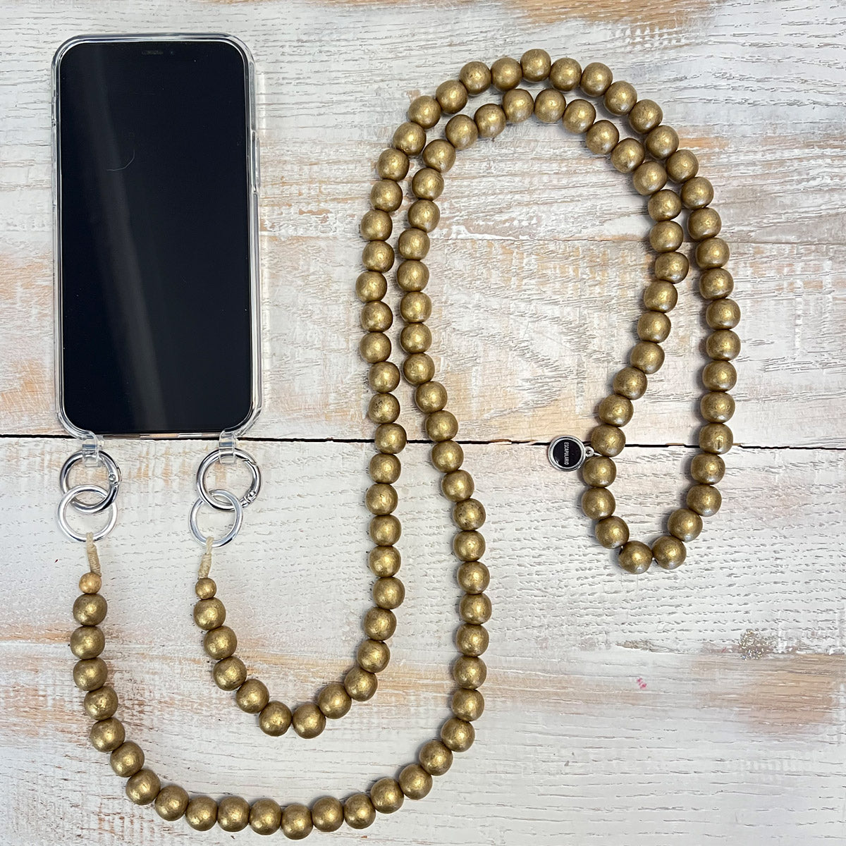 Escapulario Handykette Gold Struktur mit strukturierten Goldperlen und Karabinern als edle Smartphonekette für Damen.