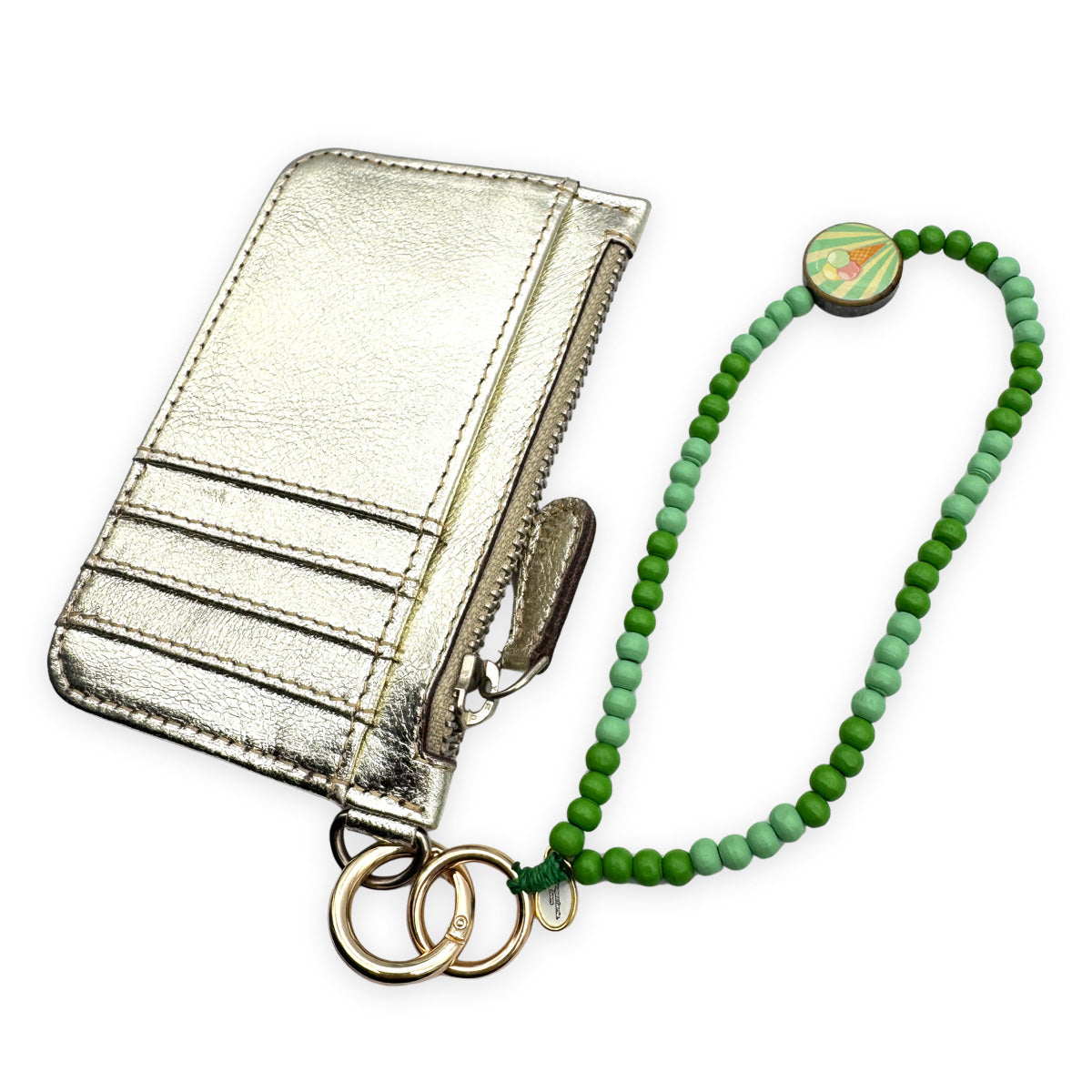 Escapulario kurze Handykette Mint-Apple mit mintgrünen Perlen, Apfel-Pin und Karabiner als fruchtiges Smartphone-Accessoire für Damen.