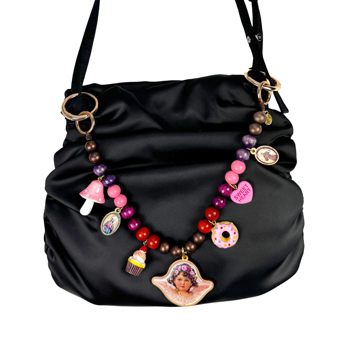 Escapulario Kollektion Taschenketten 2025, handgefertigte Taschenketten aus Holzkugeln, Glücksbringern und Motivanhängern als farbenfrohe Accessoires für Taschen und Rucksäcke.