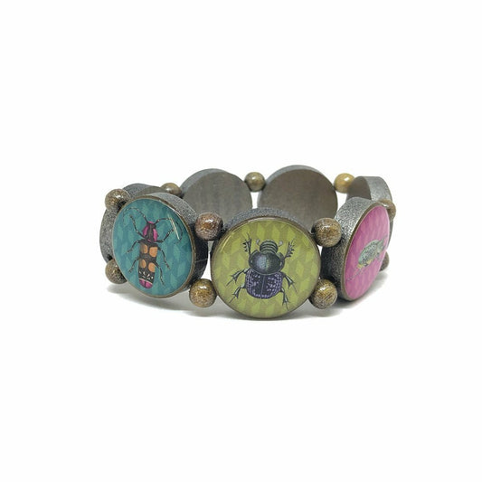 Wooden bracelet brown with silver pigments and beetle motifs