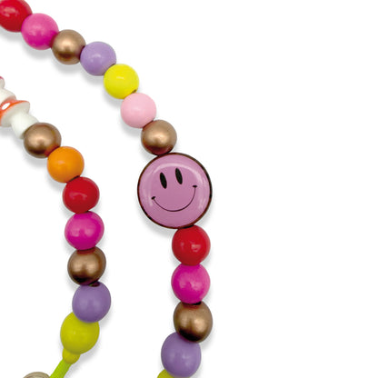 bunte Holzperlen zur Handykette smile von Escapulario mit Pilz und Ente