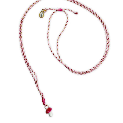 Bunte Stringkette mit pinkem Pilz