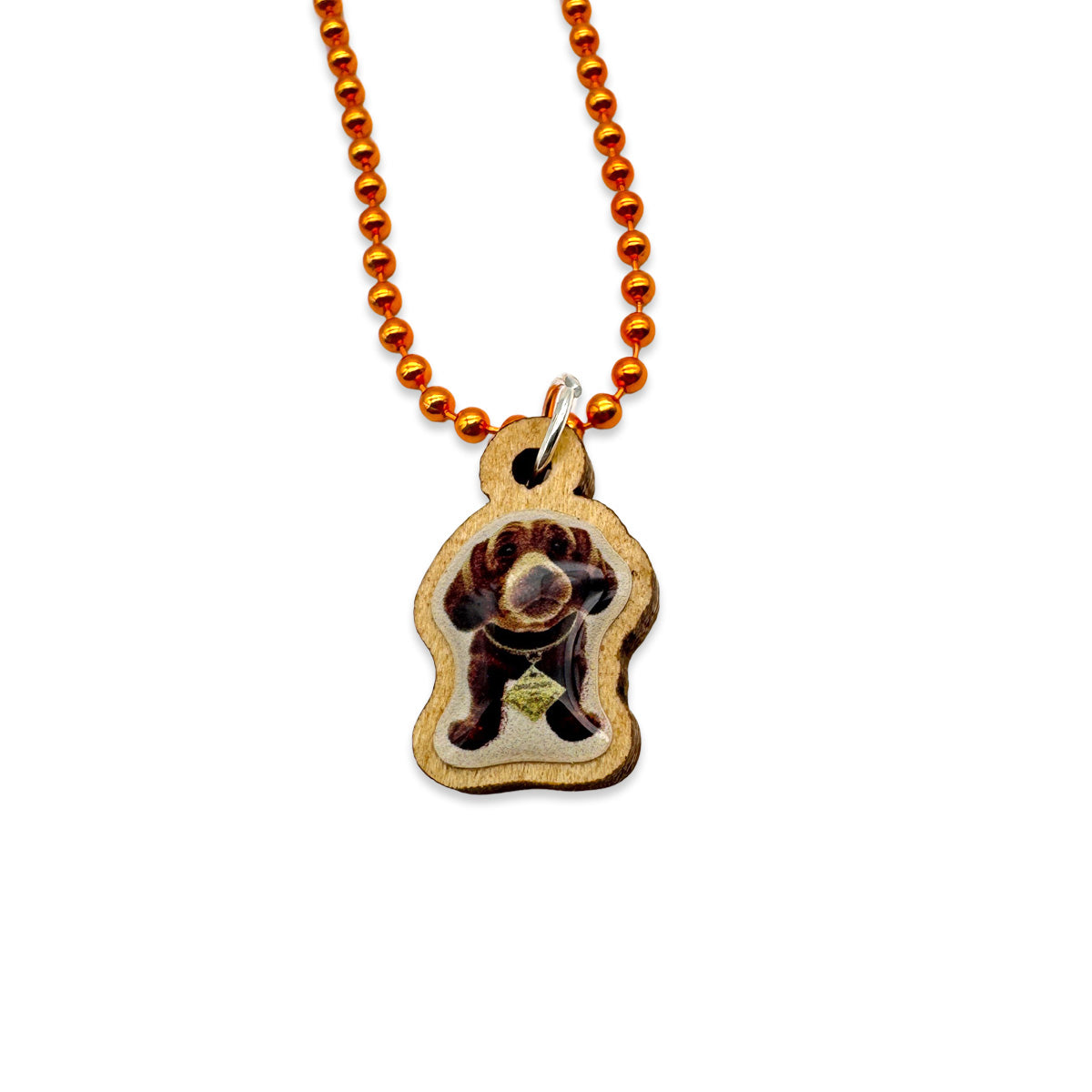 Escapulario Halskette für Damen als Metallic Kugelkette in Orange mit Dackelanhänger aus Holz.