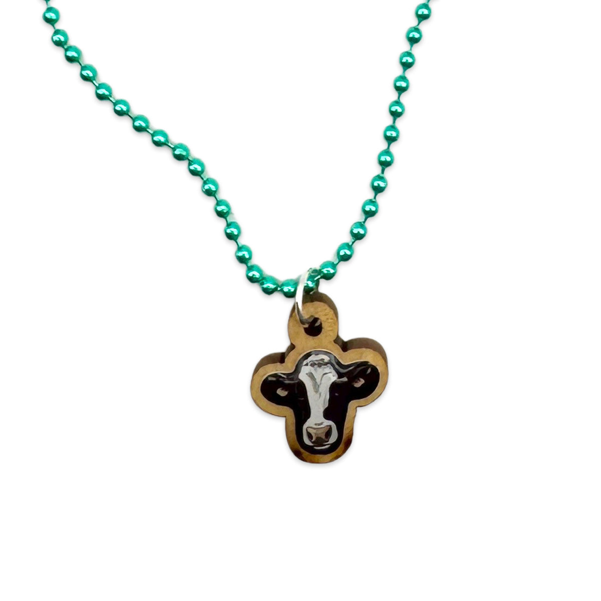 Escapulario Halskette für Damen als Metallic Kugelkette in Grün mit Kuh-Anhänger aus Holz.