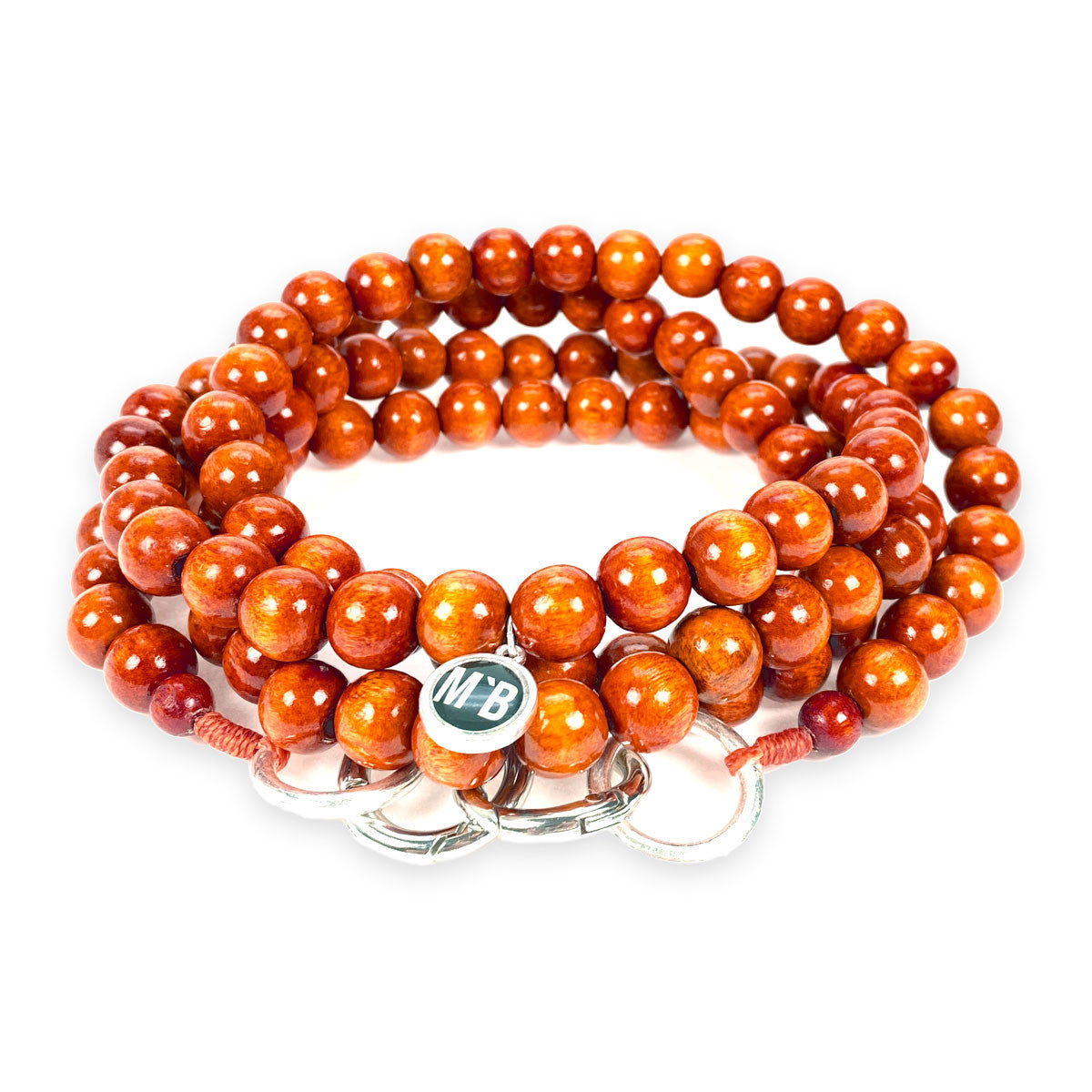 Escapulario Handykette in Terracotta mit warmen Perlen und Karabinern als trendiges Smartphone-Accessoire für Damen.