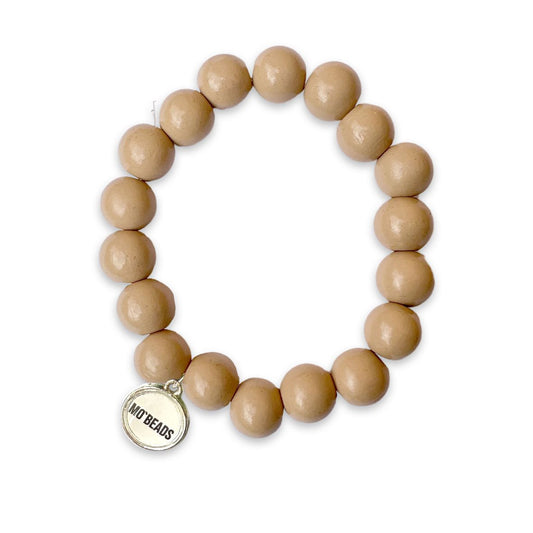 Escapulario Holzarmband in Cappuccino aus 12mm Perlen mit elastischem Band als warmes naturnahes Armband für modebewusste Damen.