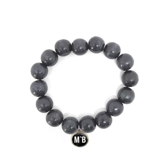 Escapulario Holzperlenarmband in Grau aus 12mm Holzperlen mit elastischem Band als schlichtes vielseitiges Accessoire für Frauen.