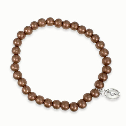 Escapulario Holzperlenarmband in Bronze als elegantes Accessoire aus Holzperlen für modebewusste Damen.