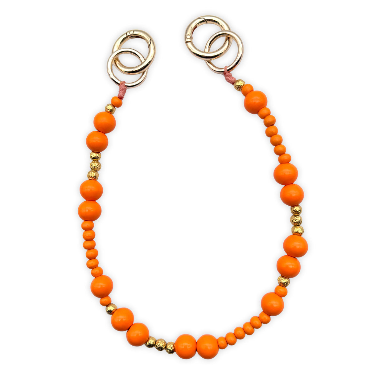 Escapulario kurze Handykette aus Holzperlen in Orange und Gold als sonniges Accessoire, das Farbe in deinen Alltag bringt.