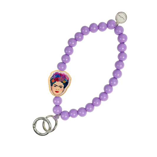 Escapulario Frida Kahlo Schlüsselkette Flieder als zartes feminines Accessoire für den Alltag eine romantische Geschenkidee für modebewusste Frauen.