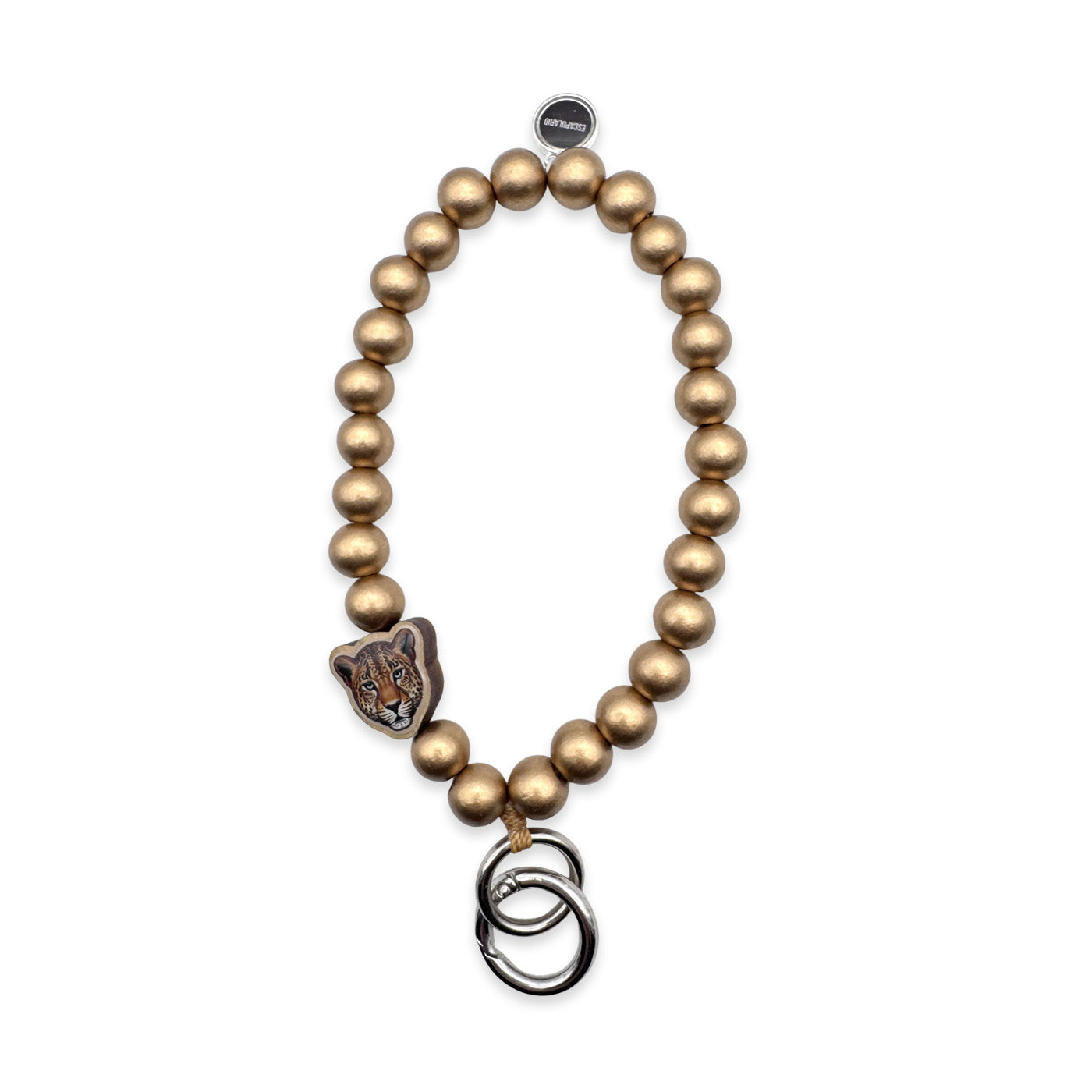 Escapulario Schlüsselkette in Gold mit Leopard-Holzpin aus Holzperlen als auffälliges Animal-Print-Accessoire für Frauen.