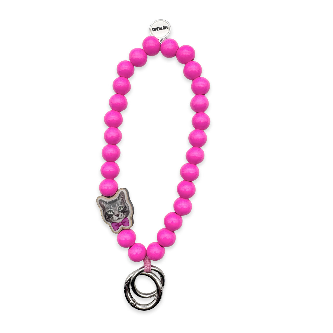 Escapulario Schlüsselkette in Lipstick-Pink mit Katzen-Holzpin, runden Perlen und Metallkarabiner als verspieltes Keychain-Accessoire für Katzenfans und junge Frauen.
