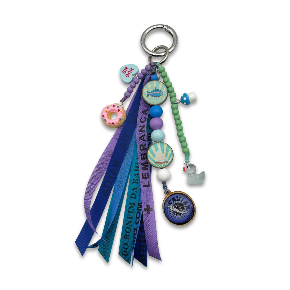 Escapulario Taschenanhänger Blue Breeze als verspielter blauer Bagcharm für Taschen und Handtaschen – das perfekte Accessoire für Frauen.