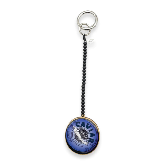 Escapulario Taschenanhänger Caviar als eleganter verspielter Bagcharm für Handtaschen und Taschen ein stilvolles Accessoire als Geschenk für anspruchsvolle Damen.