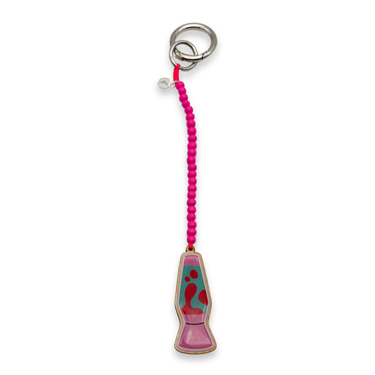 Escapulario Taschenanhänger Lavalampe als retro verspielter Bagcharm für Handtaschen und Taschen ein einzigartiges Accessoire als Geschenk für Damen.