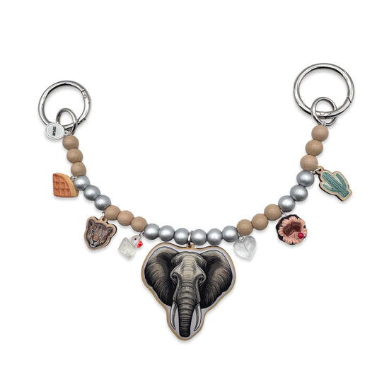 Escapulario Taschenkette mit Elefantenanhänger aus Holz, farbigen Perlen und Metallkette als liebevolles Tier-Accessoire für Damen.